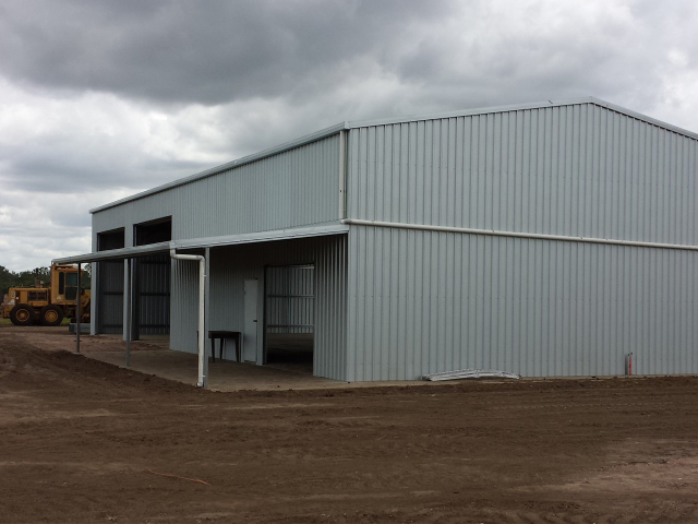 big grey farming shed